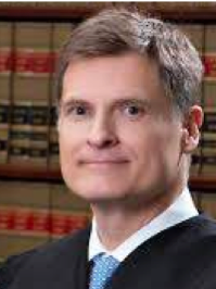 Supreme Court Justice Carlos G. Muñiz